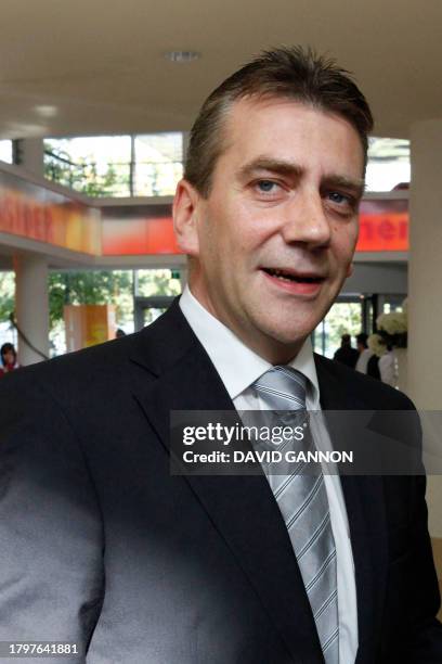 Former CDU representative Rene Stadtkewitz speaks to journalists as he arrives at a hotel in Berlin where Dutch right-wing party PVV Geert Wilders...