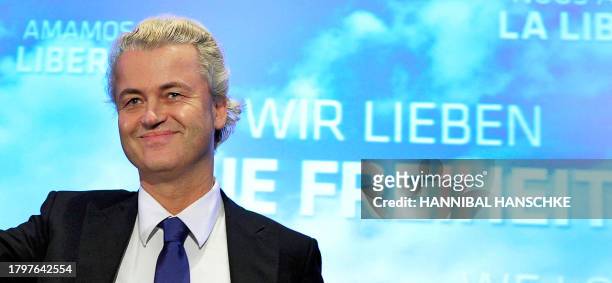 Corrects photographer Dutch right-wing party PVV Geert Wilders speaks at a hotel in Berlin on October 2, 2010. Wilders' visit to the German capital...