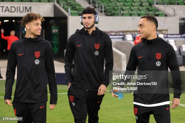 Kevin Paredes, Ricardo Pepi, and Sergiño Dest of the United States walks the field prior to playing Trinidad and Tobago in a Concacaf Nations League...