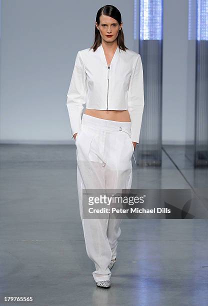 Model walks the runway at the Helmut Lang Spring 2014 fashion show during Mercedes-Benz Fashion Week on September 6, 2013 in New York City.