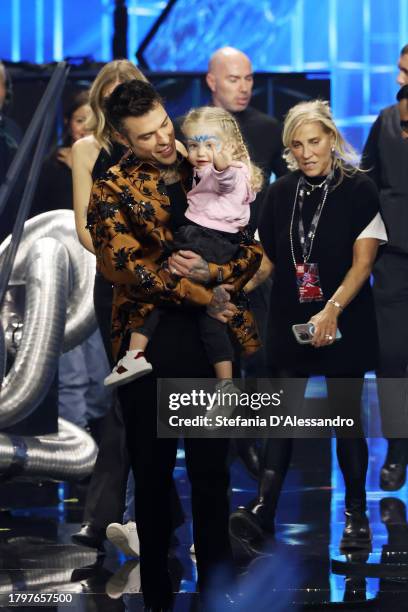 Chiara Ferragni, Fedez along with their daughter Victoria and their son Leone attend the X Factor live tv show on November 16, 2023 in Milan, Italy.