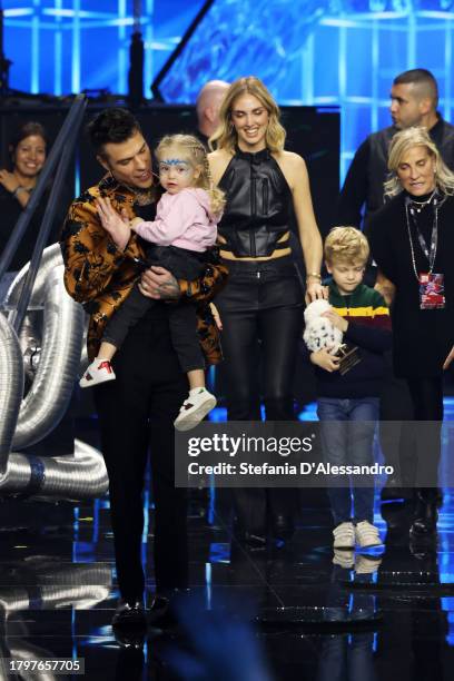 Chiara Ferragni, Fedez along with their daughter Victoria and their son Leone attend the X Factor live tv show on November 16, 2023 in Milan, Italy.