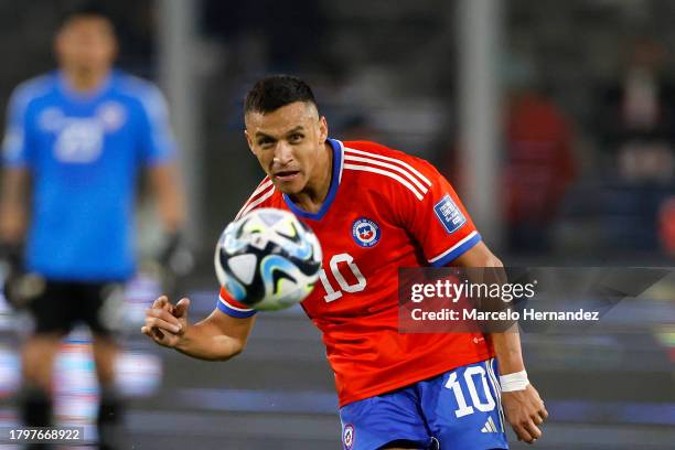 Alexis Sanchez of Chile looks at the ball during a FIFA World Cup 2026 Qualifier match between Chile and Paraguay at Estadio Monumental David...