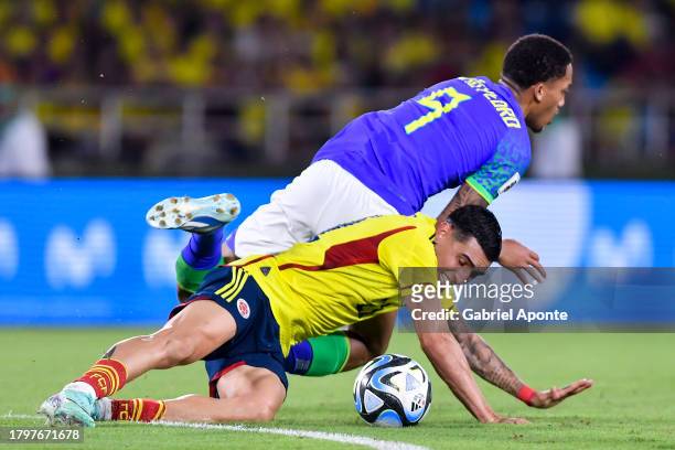 Daniel Muñoz of Colombia battles for possession with João Pedro of Brazil during the FIFA World Cup 2026 Qualifier match between Colombia and Brazil...