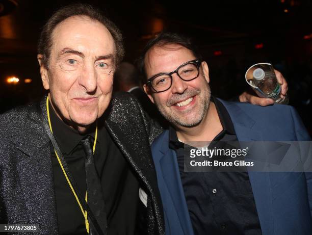 Eric Idle and Steve Rosen pose at the opening night of "Spamalot" on Broadway at The St. James Theatre on November 16, 2023 in New York City.