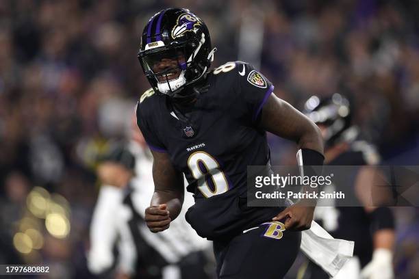 Lamar Jackson of the Baltimore Ravens celebrates after Gus Edwards scored a touchdown against the Cincinnati Bengals during the first quarter of the...