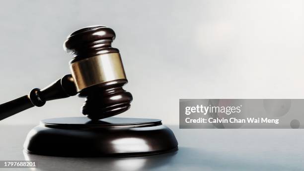 a judge hammer or gavel with clean background and copy space - sentencing fotografías e imágenes de stock