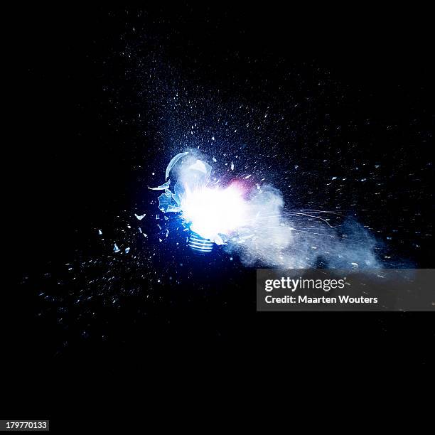 exploding lightbulb 04 - studio lighting equipment stock pictures, royalty-free photos & images