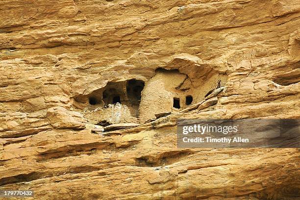 abandoned tellem caves at bandiagara cliffs - dogon stock pictures, royalty-free photos & images