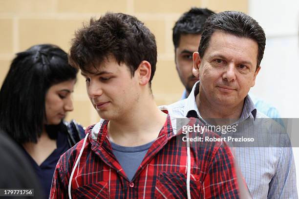 Nick Xenophon Independent senator for SA waits in line to cast his vote in the electorate of Sturt on election day on September 7, 2013 in Adelaide,...