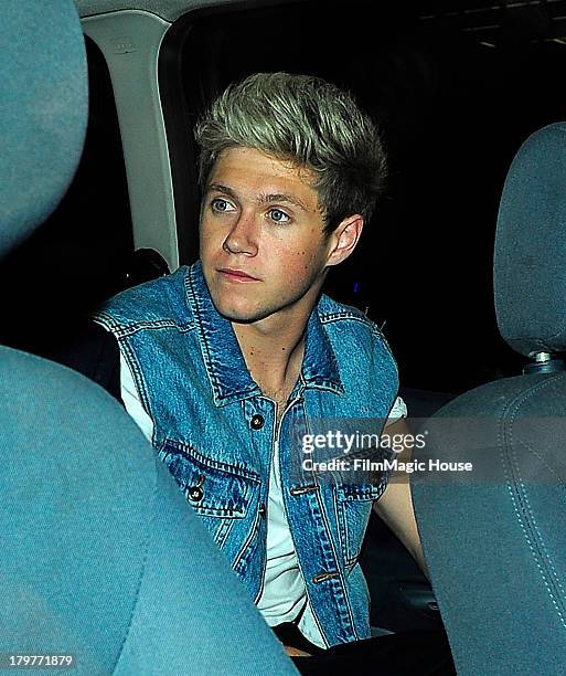 Niall Horan leaves Cafe De Paris night club with friends at 2:30am. On September 6, 2013 in London, England.