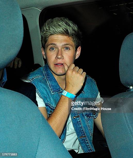 Niall Horan leaves Cafe De Paris night club with friends at 2:30am. On September 6, 2013 in London, England.
