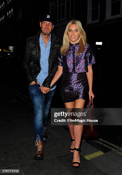 Mollie King and her Boyfriend Jordan Omley arrive at The Piccadilly Theatre to watch 'We Will Rock You' before heading to STK steak restaurant for...