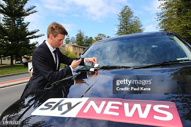 Sky News reporter takes a photograph of a parking infringement notice issued by rangers at the Cottesloe Civic Centre in the electorate of Curtin on...