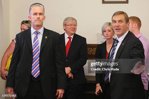 Kevin Rudd Politics Australian Prime Minister, Kevin Rudd waits to vote while media are ...
