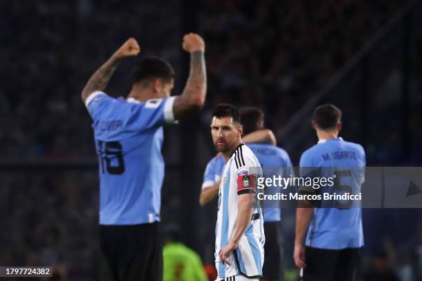 Lionel Messi of Argentina looks dejected as players of Uruguay celebrate after a FIFA World Cup 2026 Qualifier match between Argentina and Uruguay at...
