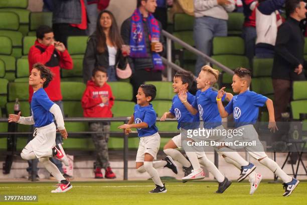 The escort kids run off the field prior to a Concacaf Nations League Quarterfinal Round leg 1 match between the United States and Trinidad and Tobago...