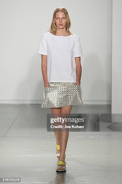 Model walks the runway at the Suno fashion show during MADE Fashion Week Spring 2014 at Center 548 on September 6, 2013 in New York City.