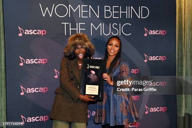 General Manager, LVRN, Amber Grimes is presented with a plaque by ASCAP SVP of Membership, Nicole George-Middleton at the 15th Annual ASCAP Women...