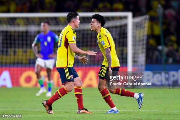 Luis Diaz of Colombia celebrates with James Rodriguez after scoring the team's first goal during the FIFA World Cup 2026 Qualifier match between...