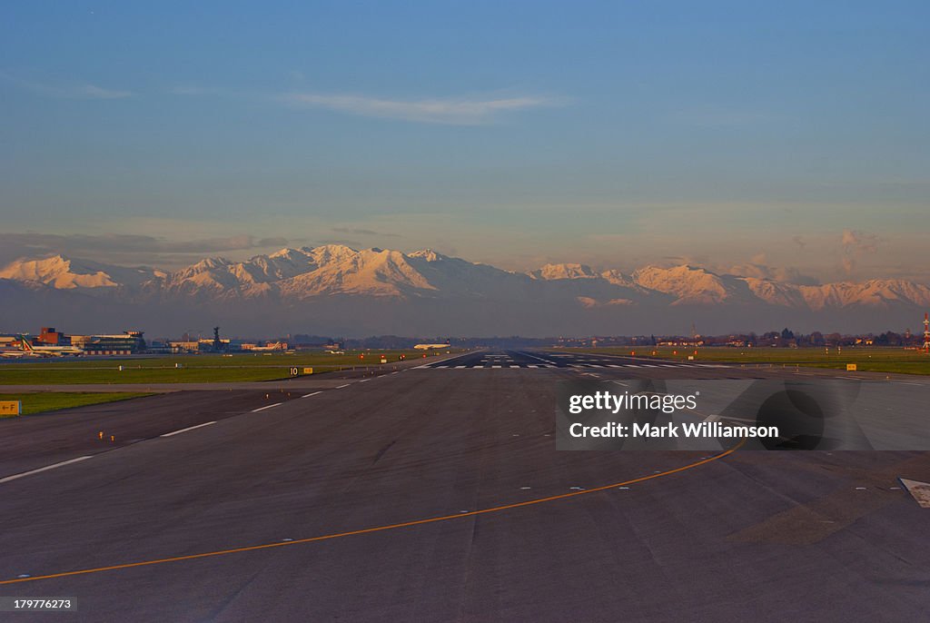 The Alps at sunset from Turin airport.