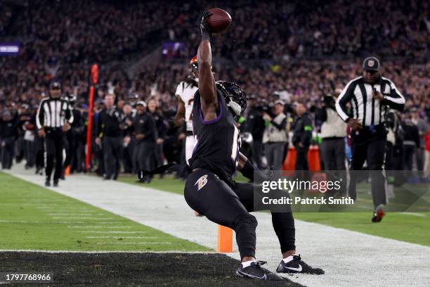 Nelson Agholor of the Baltimore Ravens does a flip in celebration after scoring a touchdown against the Cincinnati Bengals during the second quarter...