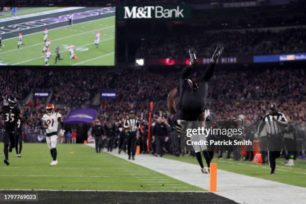 Nelson Agholor of the Baltimore Ravens does a flip in celebration after scoring a touchdown against the Cincinnati Bengals during the second quarter...