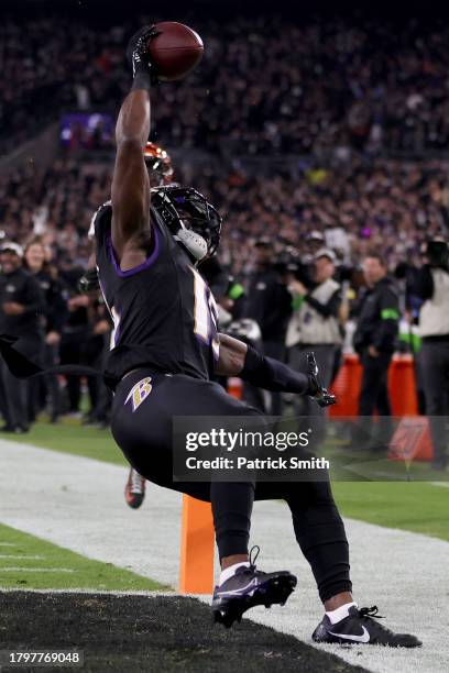 Nelson Agholor of the Baltimore Ravens does a flip in celebration after scoring a touchdown against the Cincinnati Bengals during the second quarter...