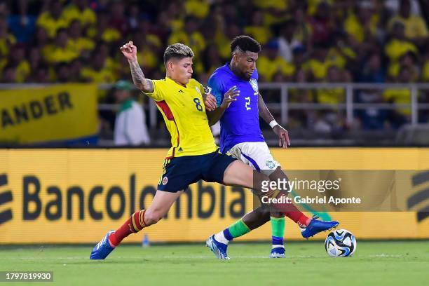 Jorge Carrascal of Colombia battles for possession with Emerson Royal of Brazil during the FIFA World Cup 2026 Qualifier match between Colombia and...