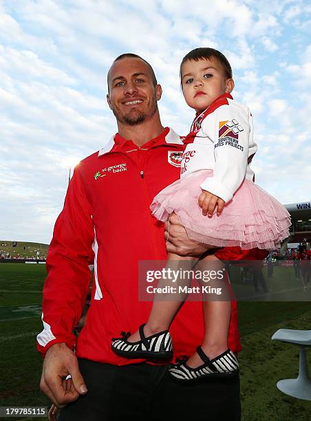 Matt Cooper of the Dragons farewells fans after the round 26 NRL match between the St George Illawarra Dragons and the New Zealand Warriors at WIN...