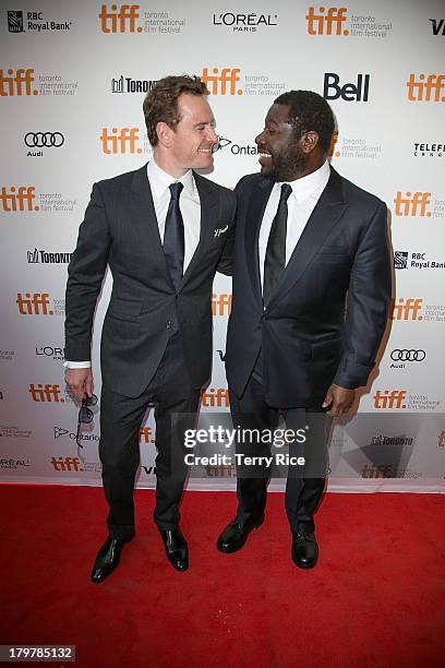 Actor Michael Fassbender and director Steve McQueen arrive at the '12 Years A Slave' premiere during the 2013 Toronto International Film Festival at...