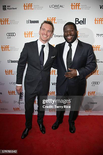 Actor Michael Fassbender and director Steve McQueen arrive at the '12 Years A Slave' premiere during the 2013 Toronto International Film Festival at...