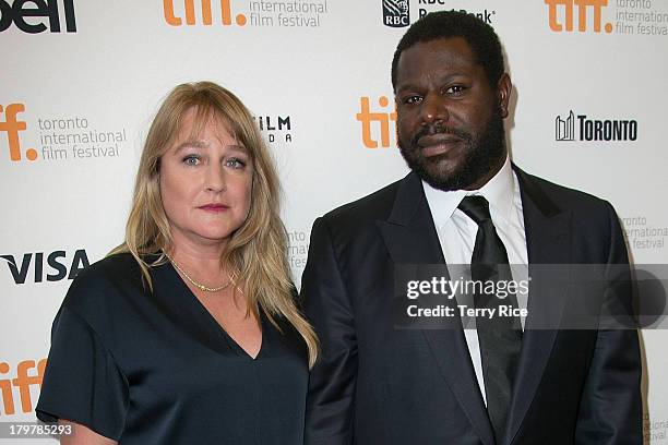 Director Steve McQueen and guest arrive at the '12 Years A Slave' Premiere during the 2013 Toronto International Film Festival Princess of Wales...