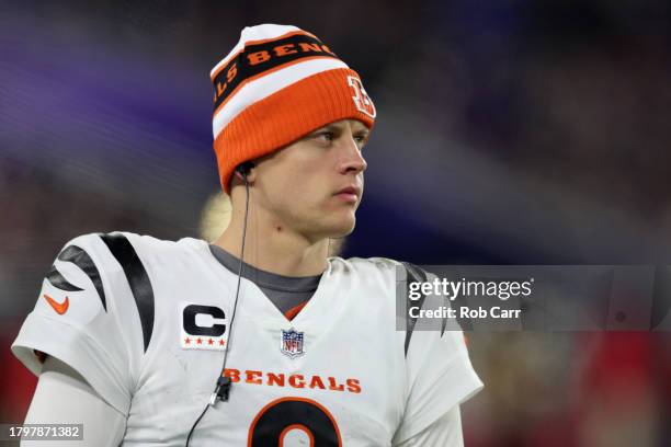 Joe Burrow of the Cincinnati Bengals looks on from the sidelines against the Baltimore Ravens during the fourth quarter of the game at M&T Bank...