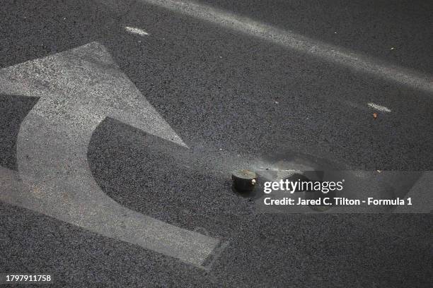 Detailed view of a drain cover on the track as seen from the McLaren VISTA during practice ahead of the F1 Grand Prix of Las Vegas at Las Vegas Strip...