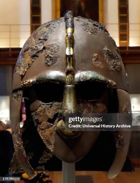 Sutton Hoo helmet. Early 7th century AD, England. One of only 4 early medieval helmets found in England. Made of Bronze, Silver wire and garnet....
