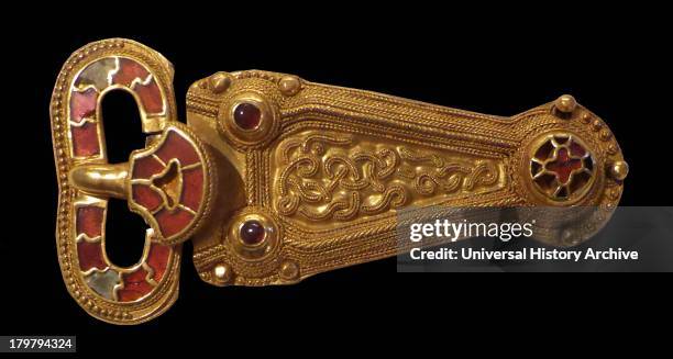 Sword belt, Anglo-Saxon, early AD 600s. Gold belt buckle, inlaid with garnets and a pair of clasps. Example of the finest in early medieval...