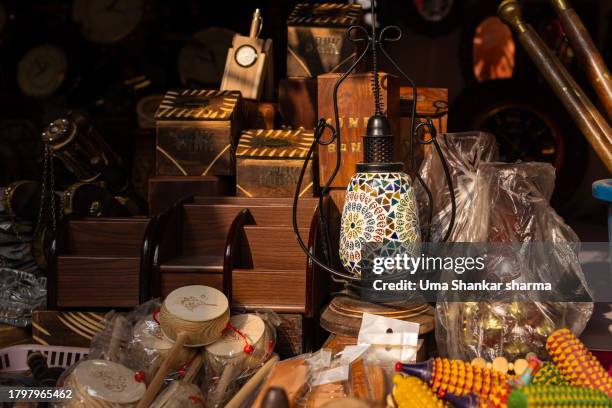 close-up of antique lantern and ornate decorations in a bazaar. - antique shop stock pictures, royalty-free photos & images