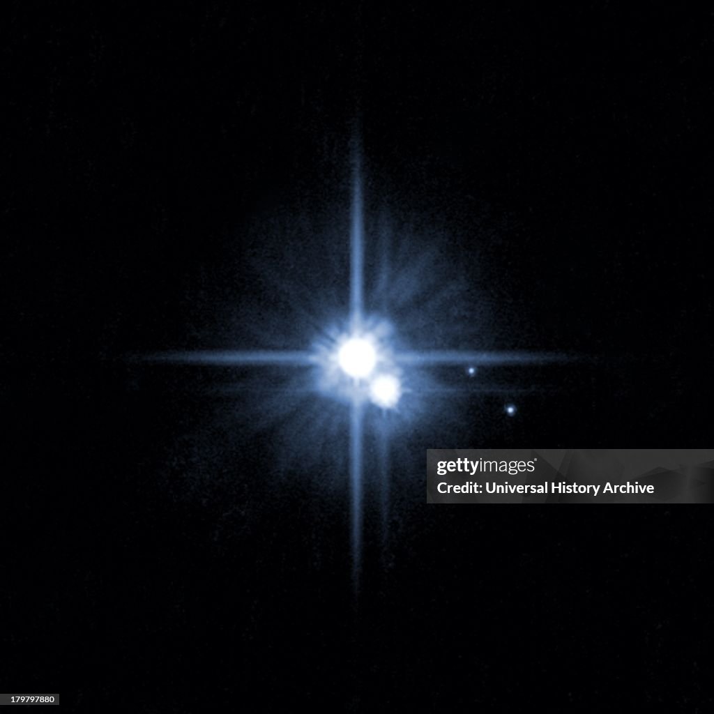 A pair of small moons orbiting pluto discovered by NASA's Hubble Space Telescope: Nix and Hydra are roughly 5,000 times fainter than Pluto and are about two to three times farther from Pluto than its large moon, Charon.