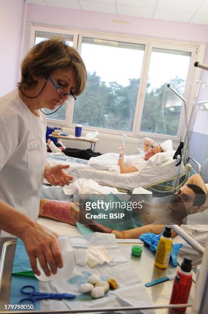 Henry Gabrielle hospital, Lyon, France. Department of urology. Postoperative nursing care of trans man patient after a sex reassignment surgery,...