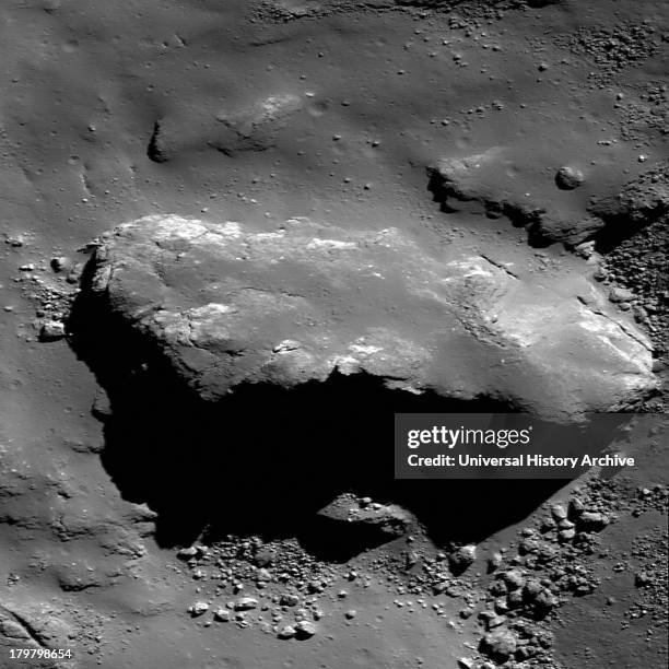 Meter block of ejecta in Tycho crater covered by a veneer of impact melt.