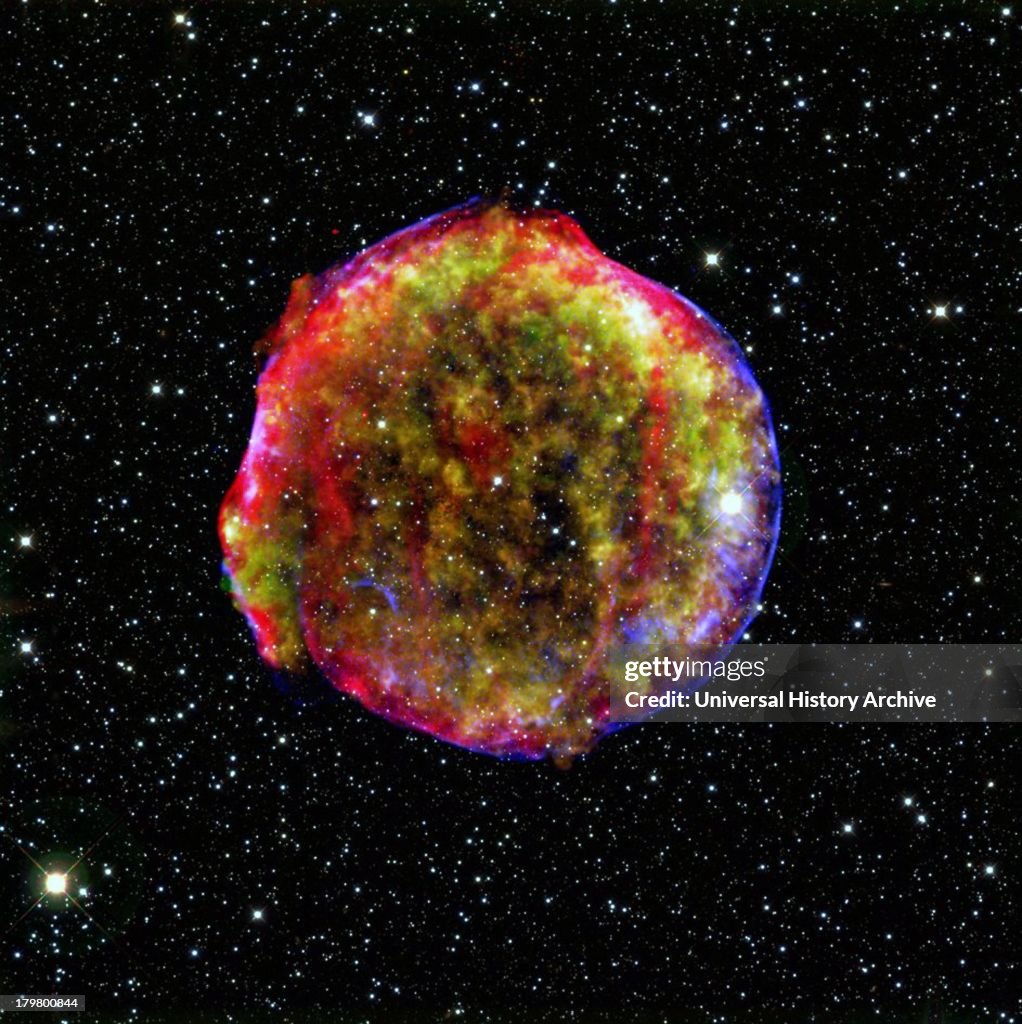A composite image of the Tycho supernova remnant. Spitzer and Chandra space observatories. It shows the scene more than four centuries after the star explosion.