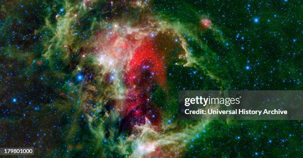 This WISE mosaic is of the Soul Nebula . It is an open cluster of stars surrounded by a cloud of dust and gas over 150 light-years across and located...