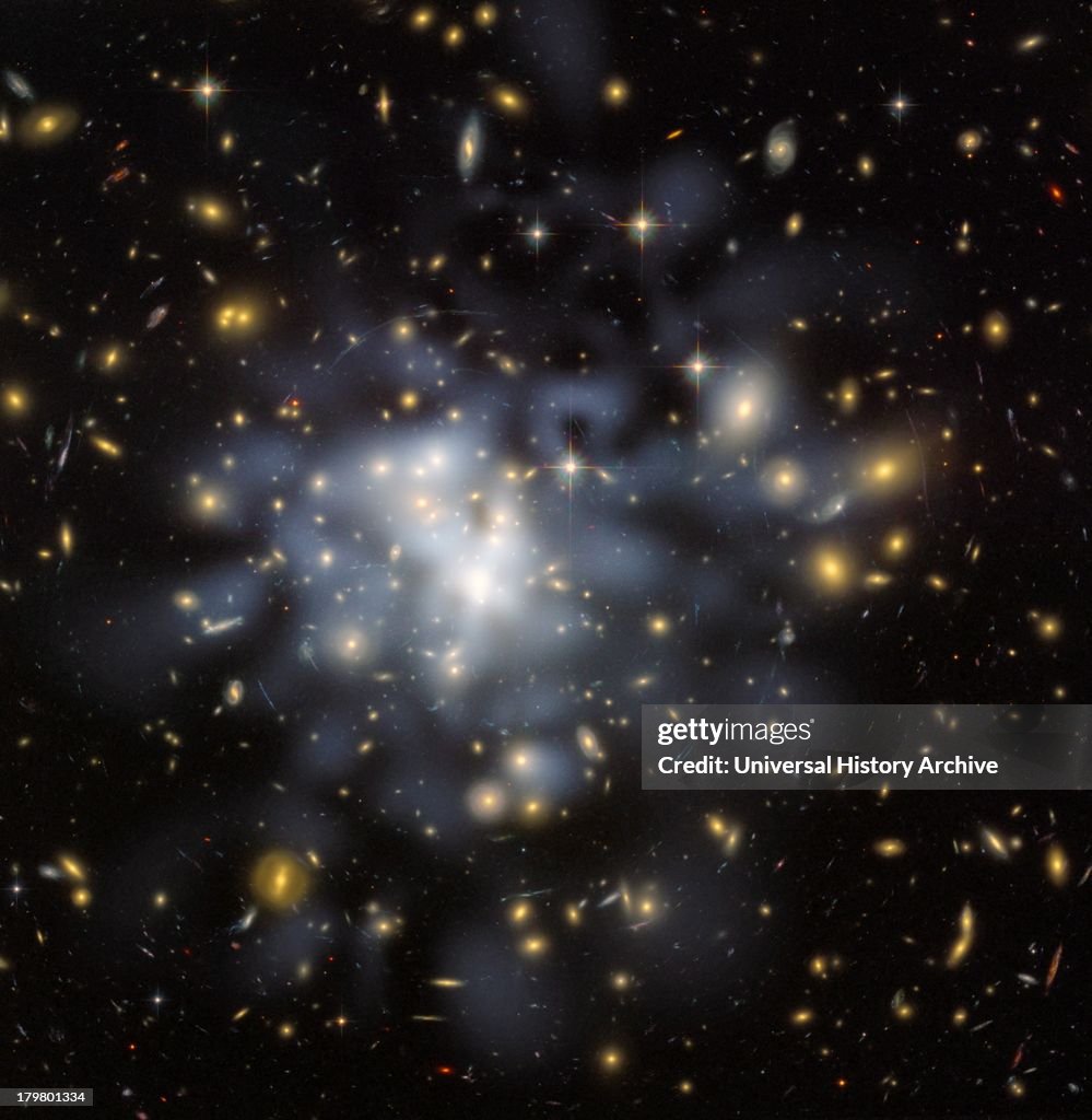 This NASA Hubble Space Telescope image shows the distribution of dark matter in the center of the giant galaxy cluster Abell 1689, containing about 1,000 galaxies and trillions of stars.