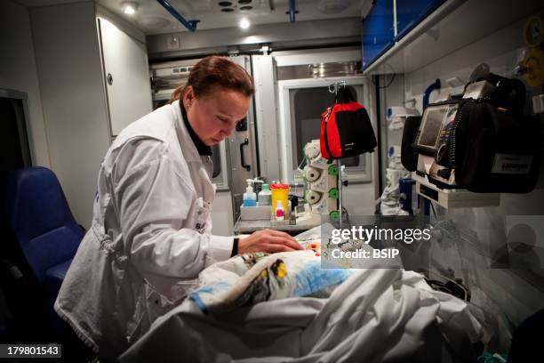 Emergency Medical Service team of Pontoise hospital, France. 18-month-old baby having convulsions due to fever.