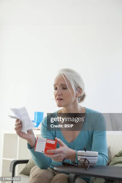 Elderly Person Taking Medication.