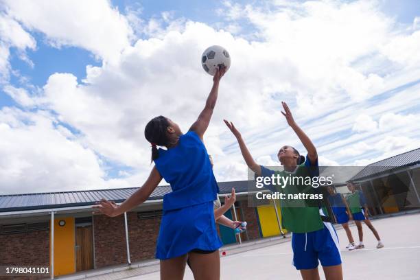 netball coach starts the game - netball court stock pictures, royalty-free photos & images