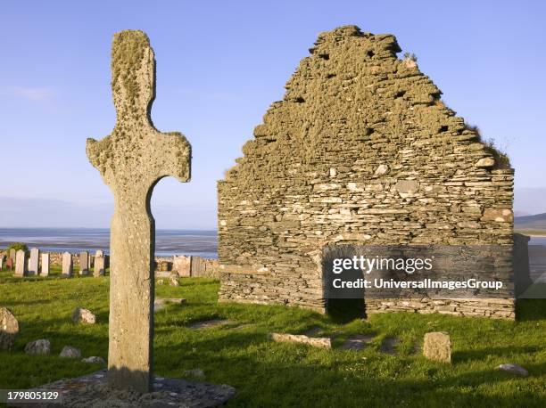 Ancient cross at Kilnave, Loch Gruinart, Islay, Scotland, United Kingdom.