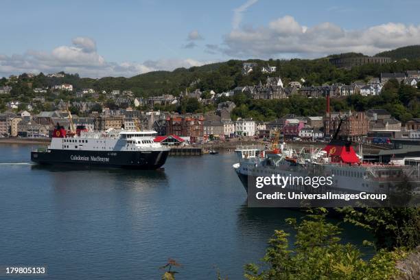 Finlaggan and MV Isle of Mull ships in Oban Bay, seen from Pulpit Hill, Oban, Argyll, Scotland, United Kingdom.