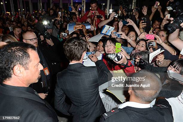 Zac Efron meets fans at the premier of Parkland at Roy Thomson Hall on September 6, 2013 in Toronto, Canada.